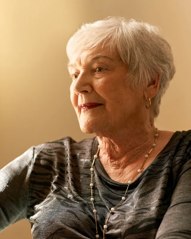 A Comfort Care at Home carer warmly engaging with an older person at home